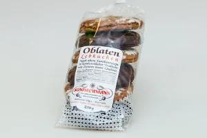 In Cellophan verpackte Oblaten-Lebkuchen schokoliert und mit Zuckerglasur gemischt