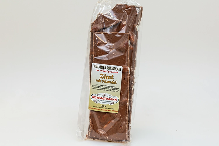 Abbildung von Zimtschokolade im Cellophanbeutel